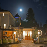 December 21st, 2018.  The winter solstice full moon shines over Alexander's Lodge in Ashford, Washington.